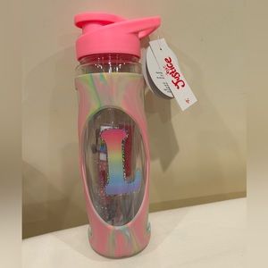 Justice “L” tumbler with Lip Balm. Brand new never opened.